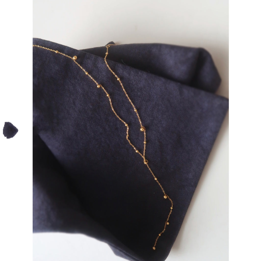 Y-shaped Necklace With A Tassel Pendant And Round Beads